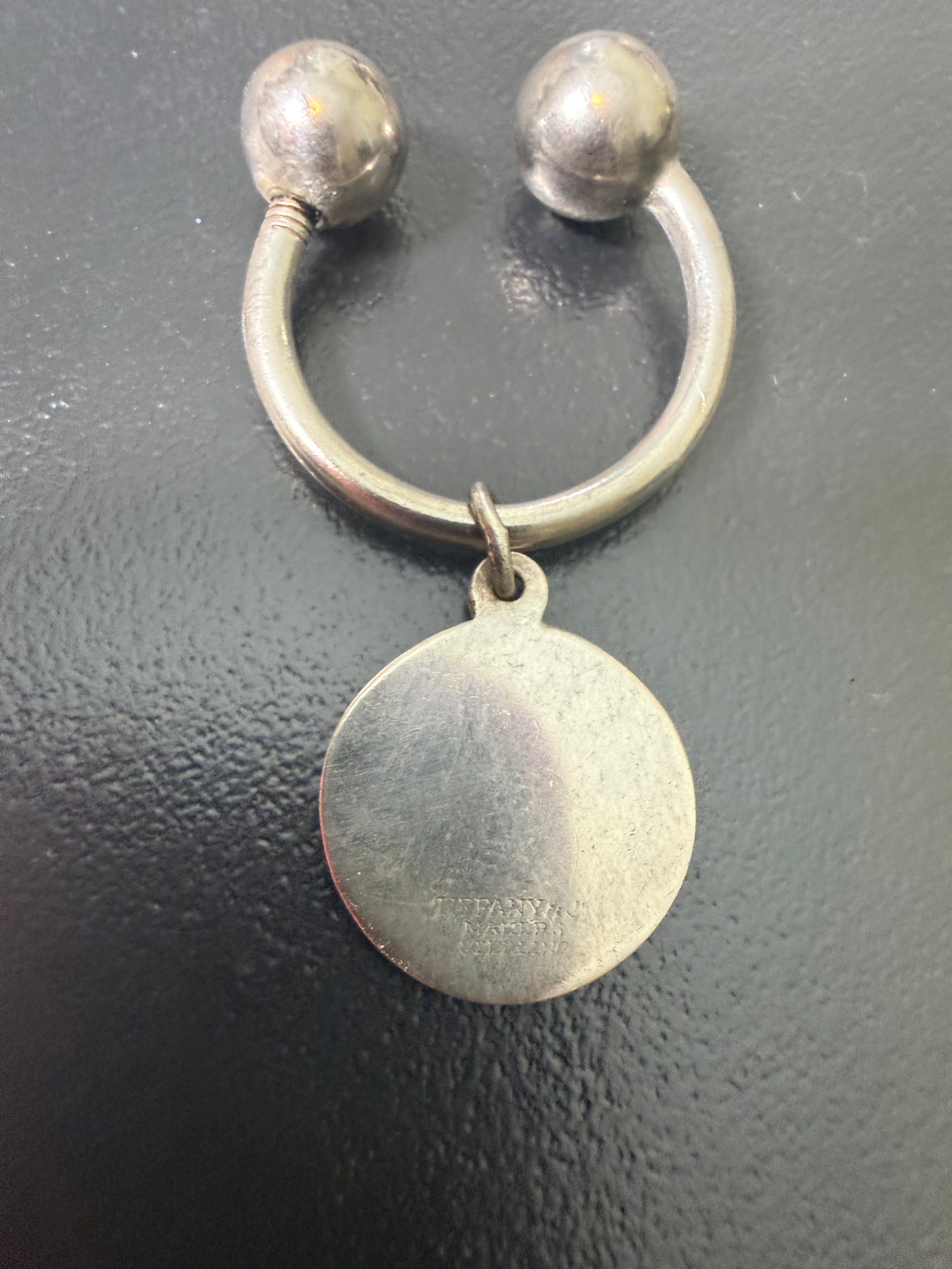 Très joli bijoux de sac Tiffany